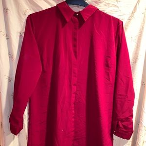 Long button down blouse.